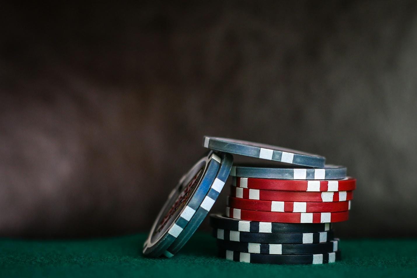 How the monthly bonus calculator at Stake Canada rewards your gameplay 1 selective focus photo of poker chips